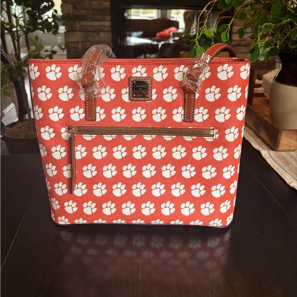 Dooney & Bourke Orange Paw Print Tote - Picture 1 of 4